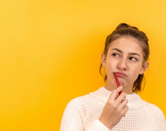 woman in white and black checkered dress shirt